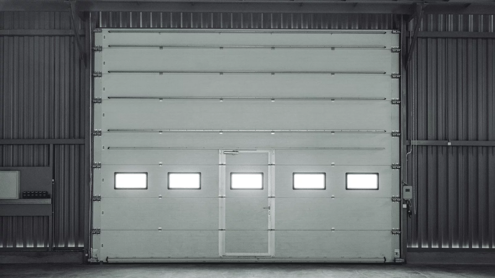 Image of a grey sectional overhead industrial door